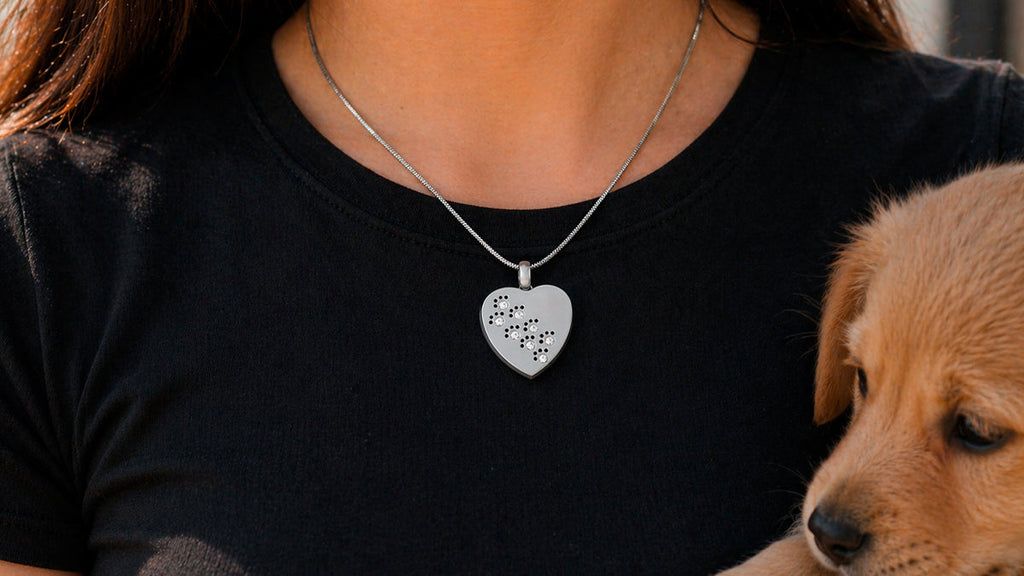 Best pet cremation memorials including urns, keepsake jewelry, and memory boxes for dogs and cats from Urns.com