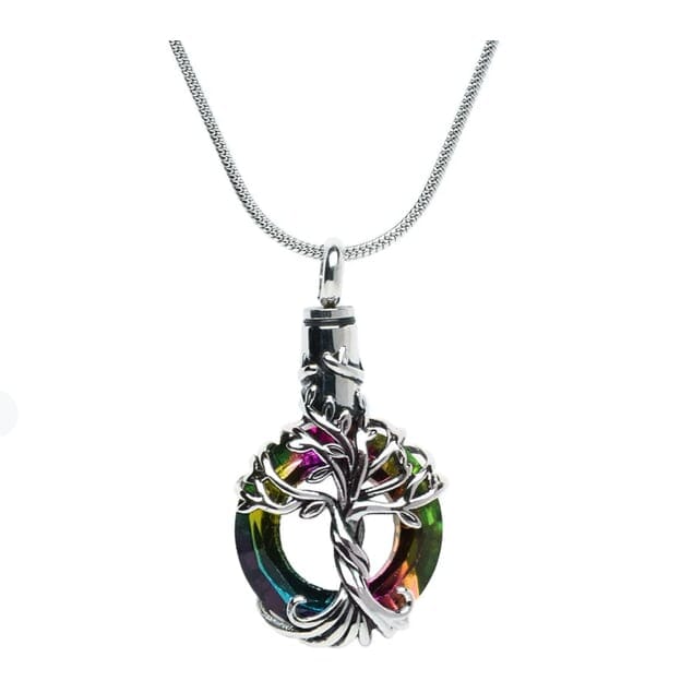 The Iridescent Cut Glass with Tree of Life Cremation pendant has the roots embracing a cut glass ring with shades of blue and green.