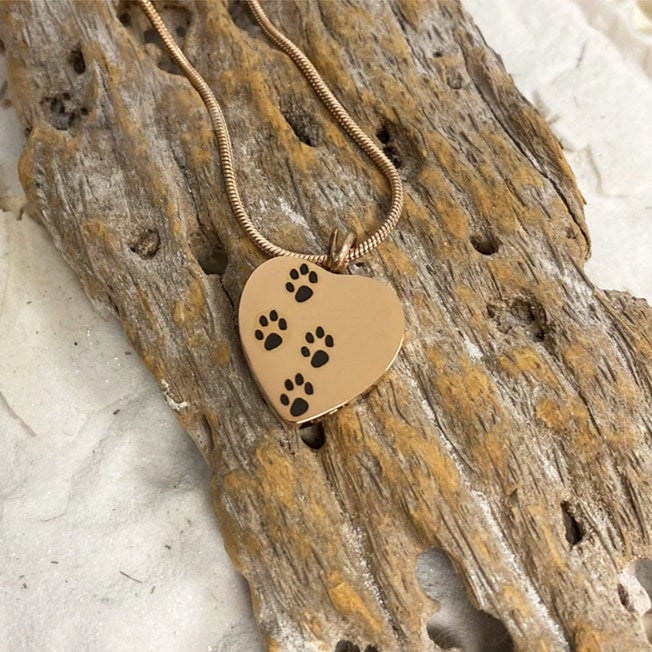 Four Paw Prints Heart Pendant