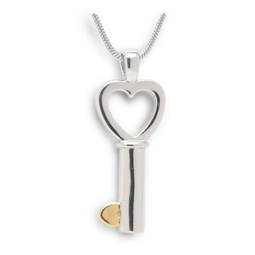 Silberner Schlüssel mit goldenem Herz-Anhänger zur Feuerbestattung